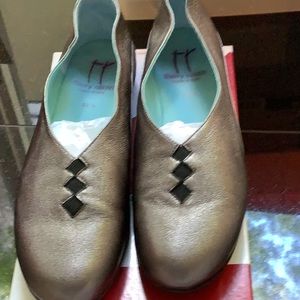 Bronze colored slip on flats